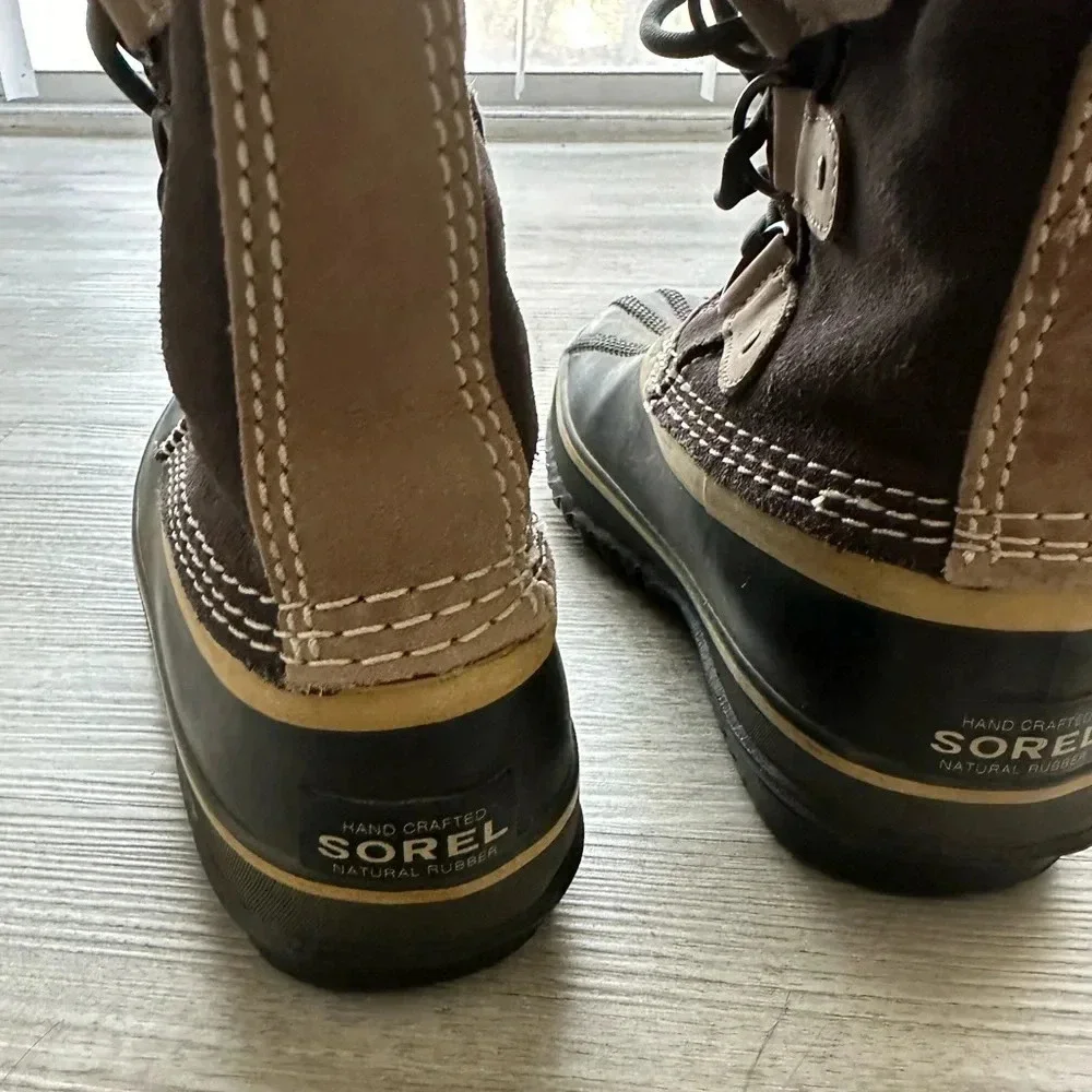 Sorel boots size 7 very roomy waterproof army green suede with faux fur.